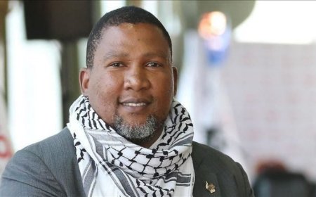 حفيد "مانديلا" بالكوفية الفلسطينية 